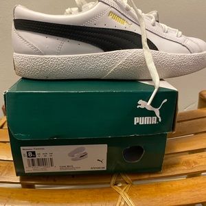 Women’s black and white puma sneakers